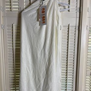 White poncho / cover up.